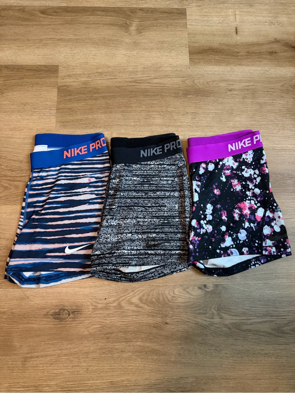 Nike Girls 3-Pack Athletic Shorts - Blue, Gray, Black with Pink/Purple Accents